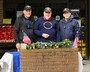 Post 370 Legionnaires giving away poppies at Bryson's Grocery.